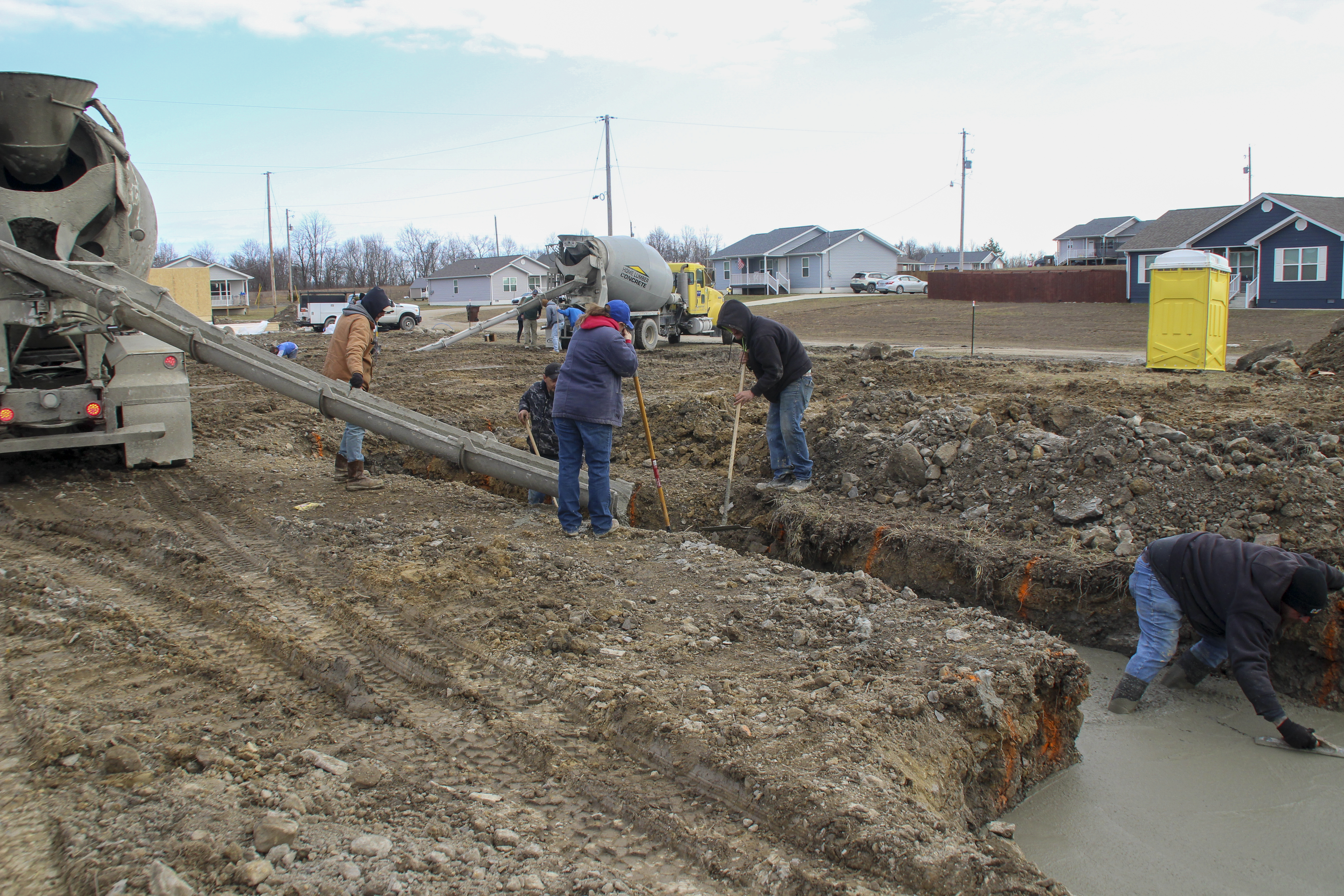 HDA crews digging footers for two new houses
