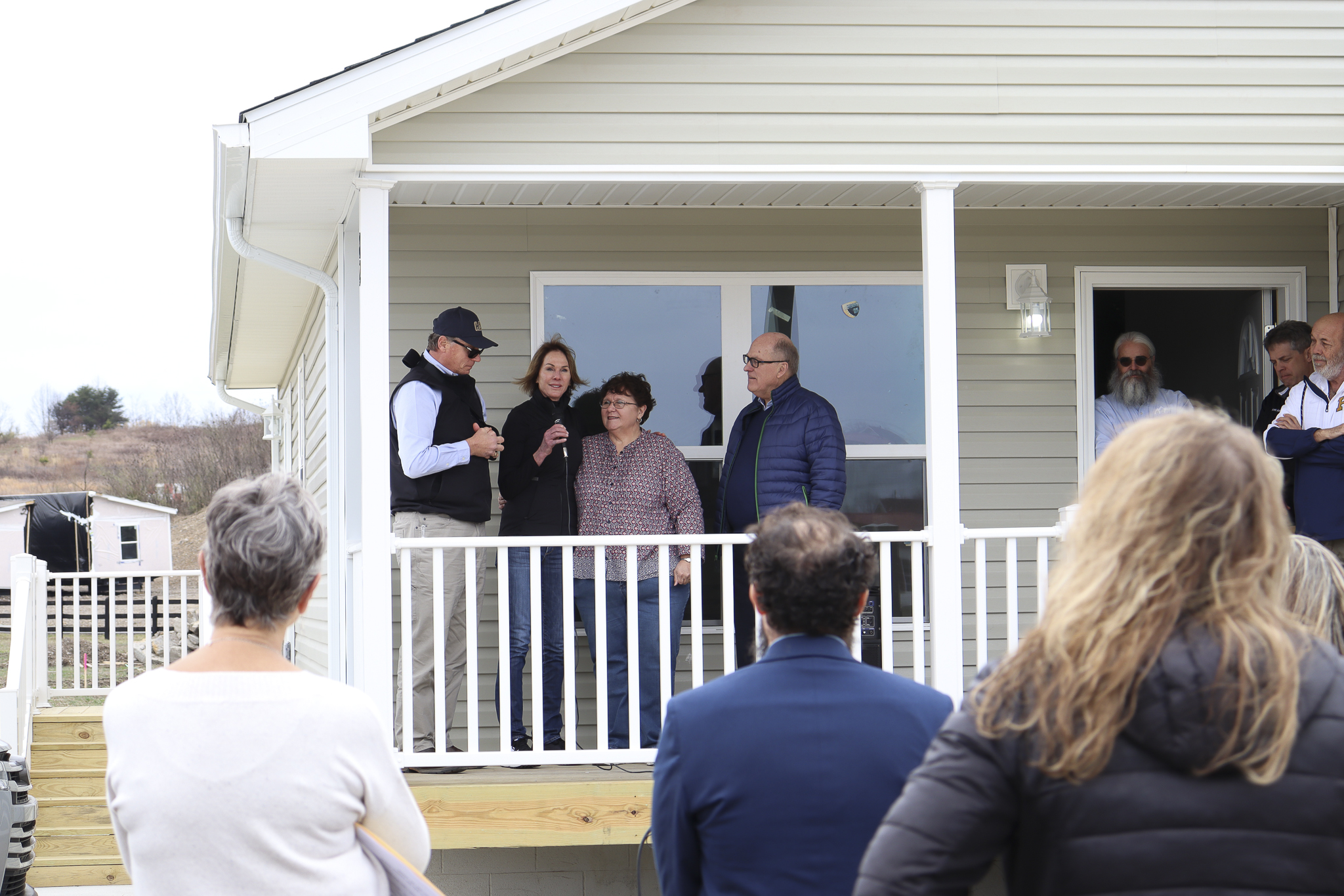a celebration at Sherry and George Mullins' new house in Chavies, Kentucky